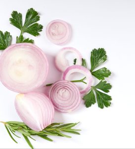 red whole sliced onion fresh onion isolated white surface with clipping path sliced red onion with parsley white scaled e1668599843424
